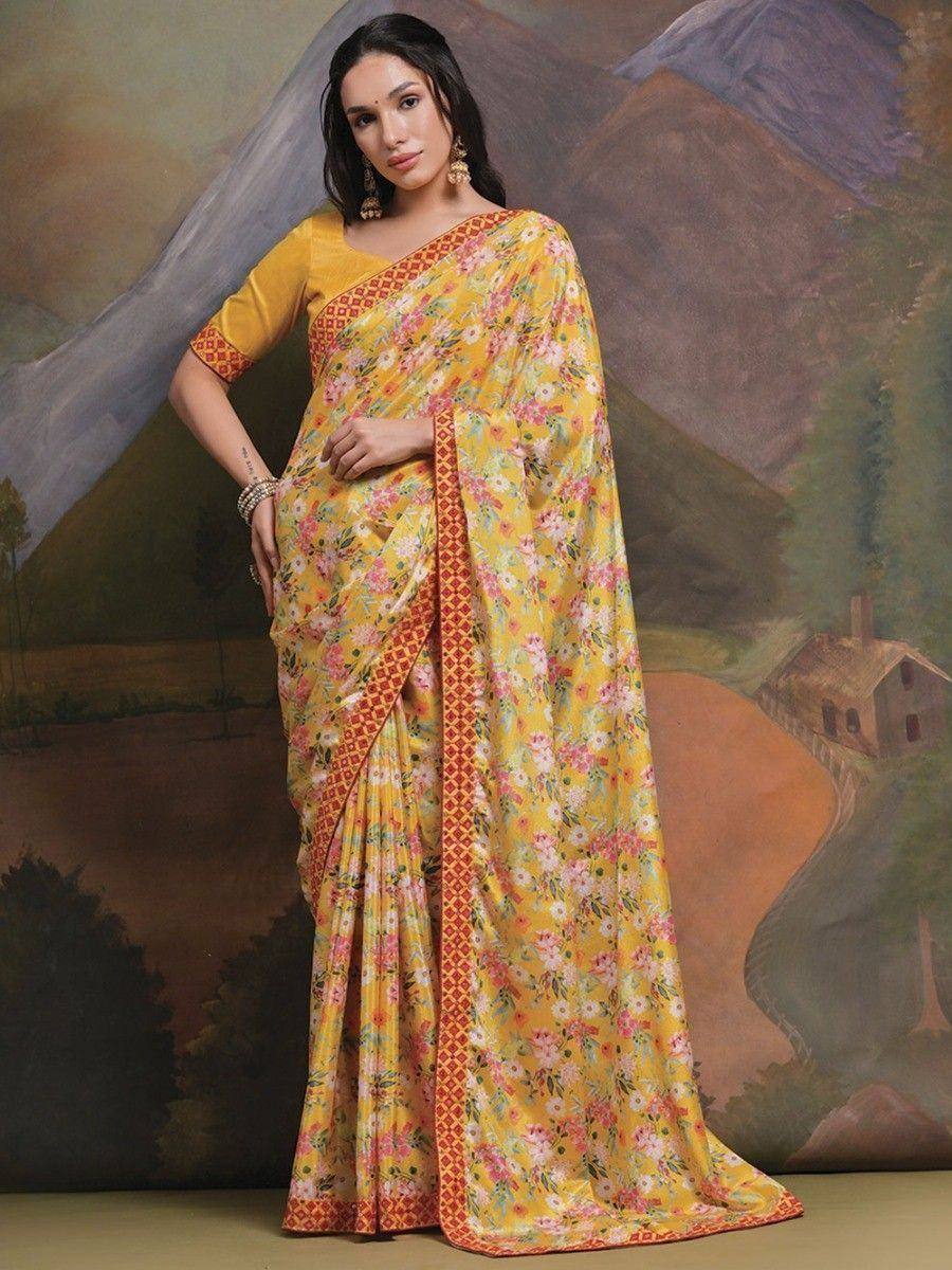 Yellow floral print saree with red border, paired with matching blouse, ideal for ethnic occasions