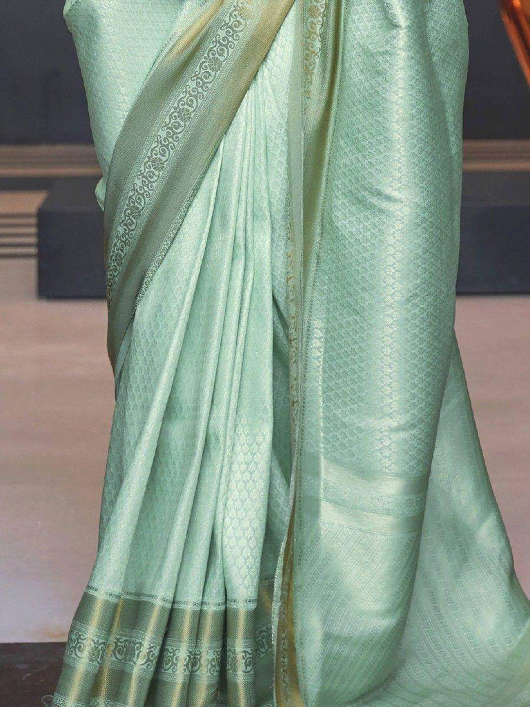 Captivating Sea Green Zari Woven Silk Wedding Wear Saree With Blouse