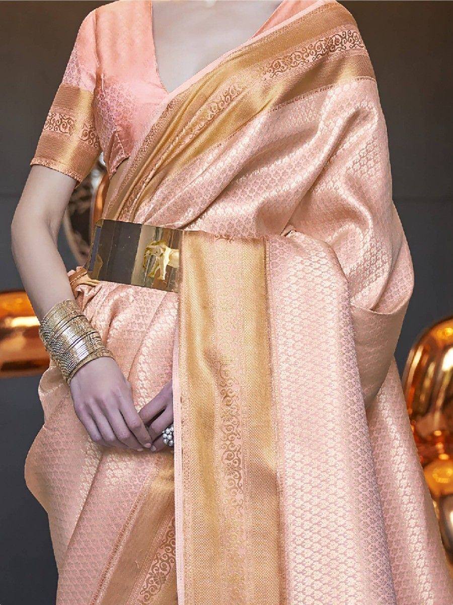 Pink and gold designer saree with intricate border, perfect for ethnic occasions and festive wear