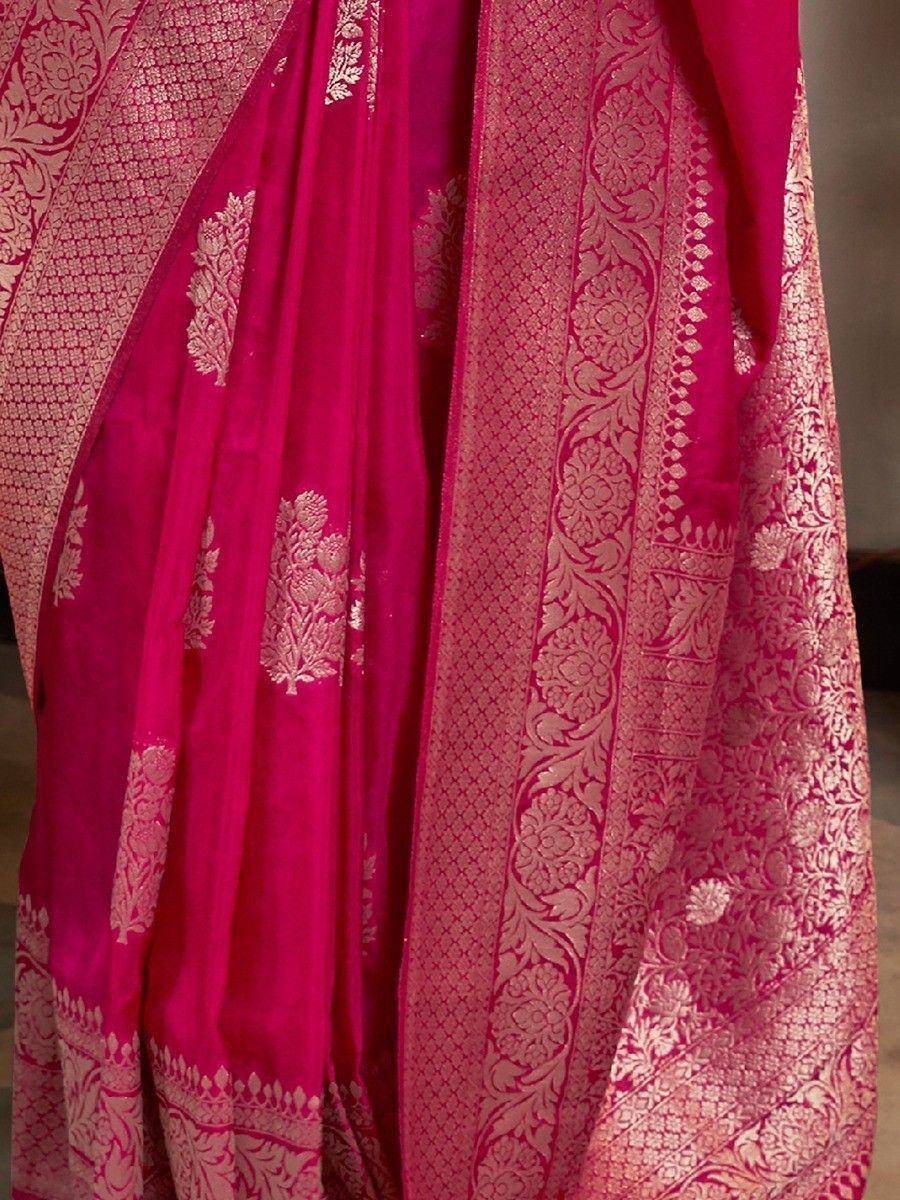 Fuchsia pink saree with gold floral zari work, perfect for Indian ethnic wear occasions