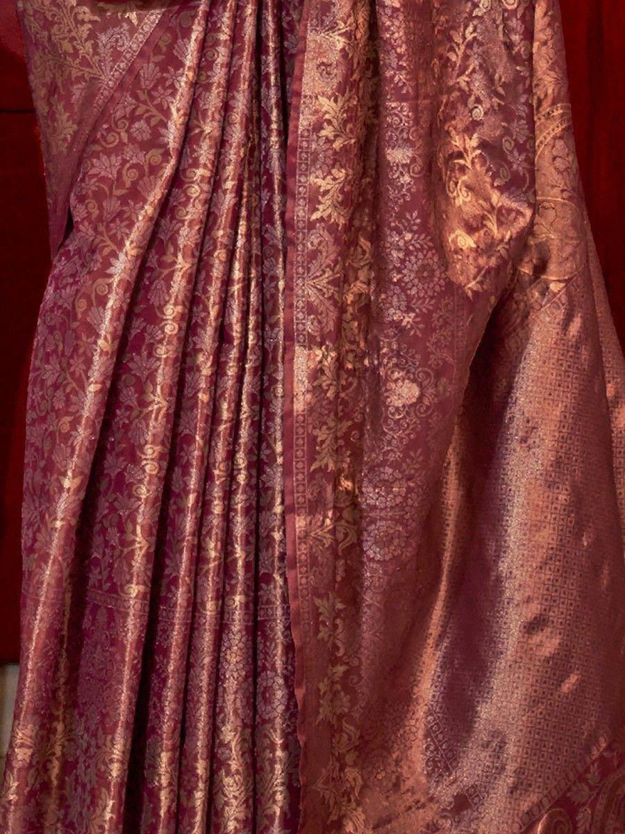 Rich maroon saree with gold floral embroidery, ideal for Indian ethnic occasions