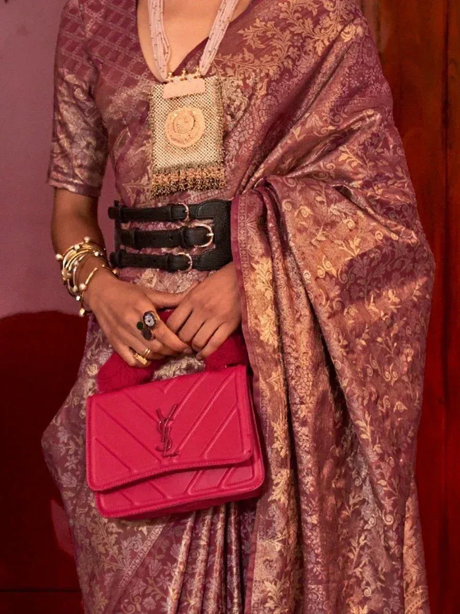 Elegant maroon saree with gold embroidery, black belt, and pink YSL handbag for festive ethnic wear