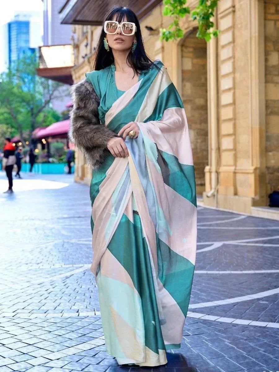 Stylish woman in green and pastel geometric saree with fur jacket, urban street setting