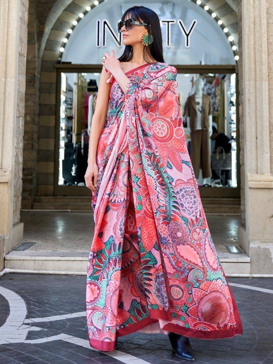 Woman in vibrant pink floral print ethnic gown, stylish streetwear for Indian fashion lovers