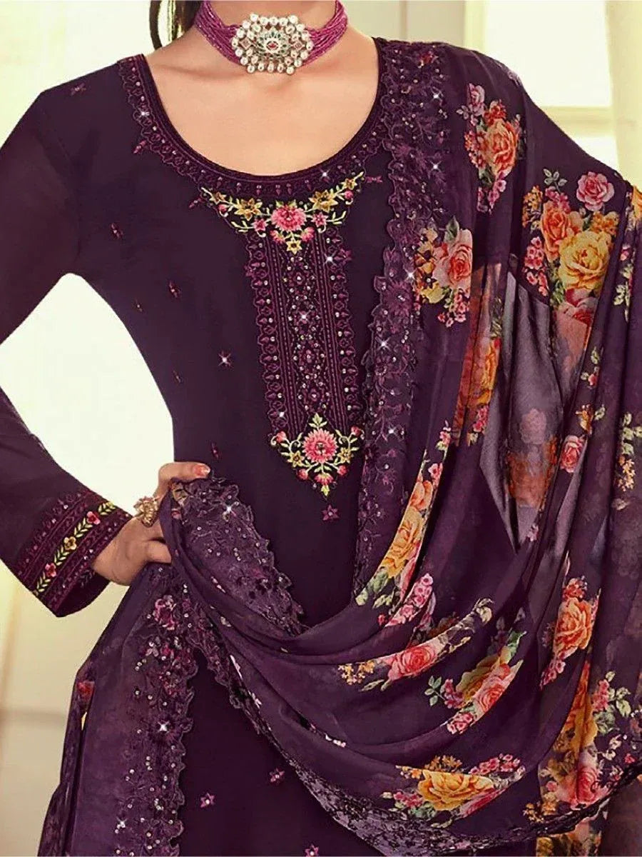 Woman wearing purple floral embroidered salwar kameez with matching dupatta and choker