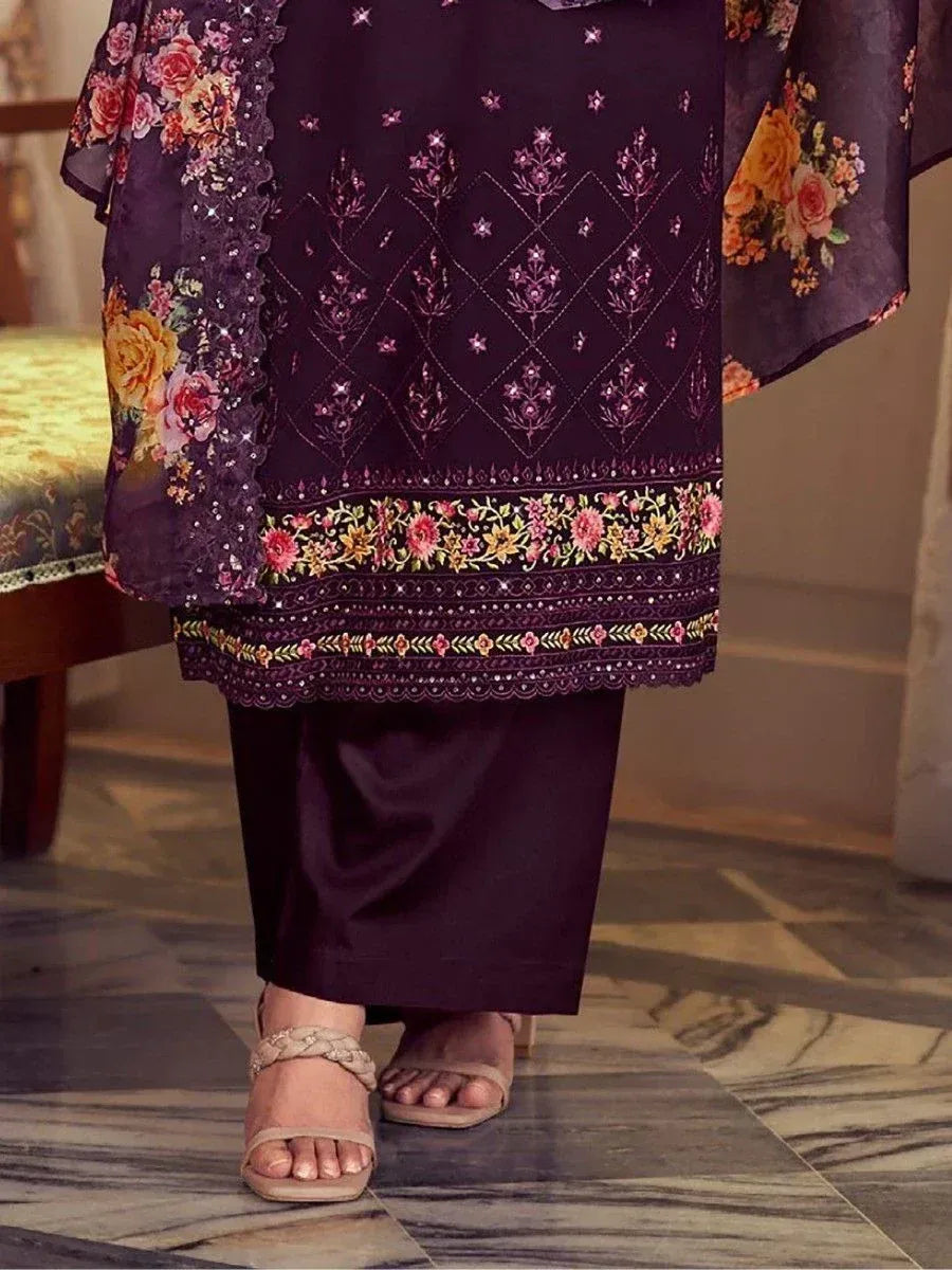 Purple floral embroidered salwar kameez with matching pants and beige sandals