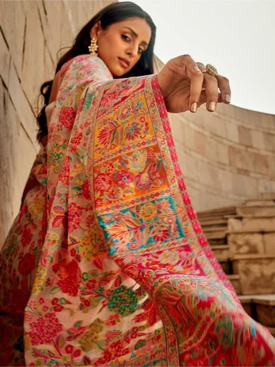 Vibrant floral Indian ethnic saree with intricate border, perfect for festive occasions and traditional wear.
