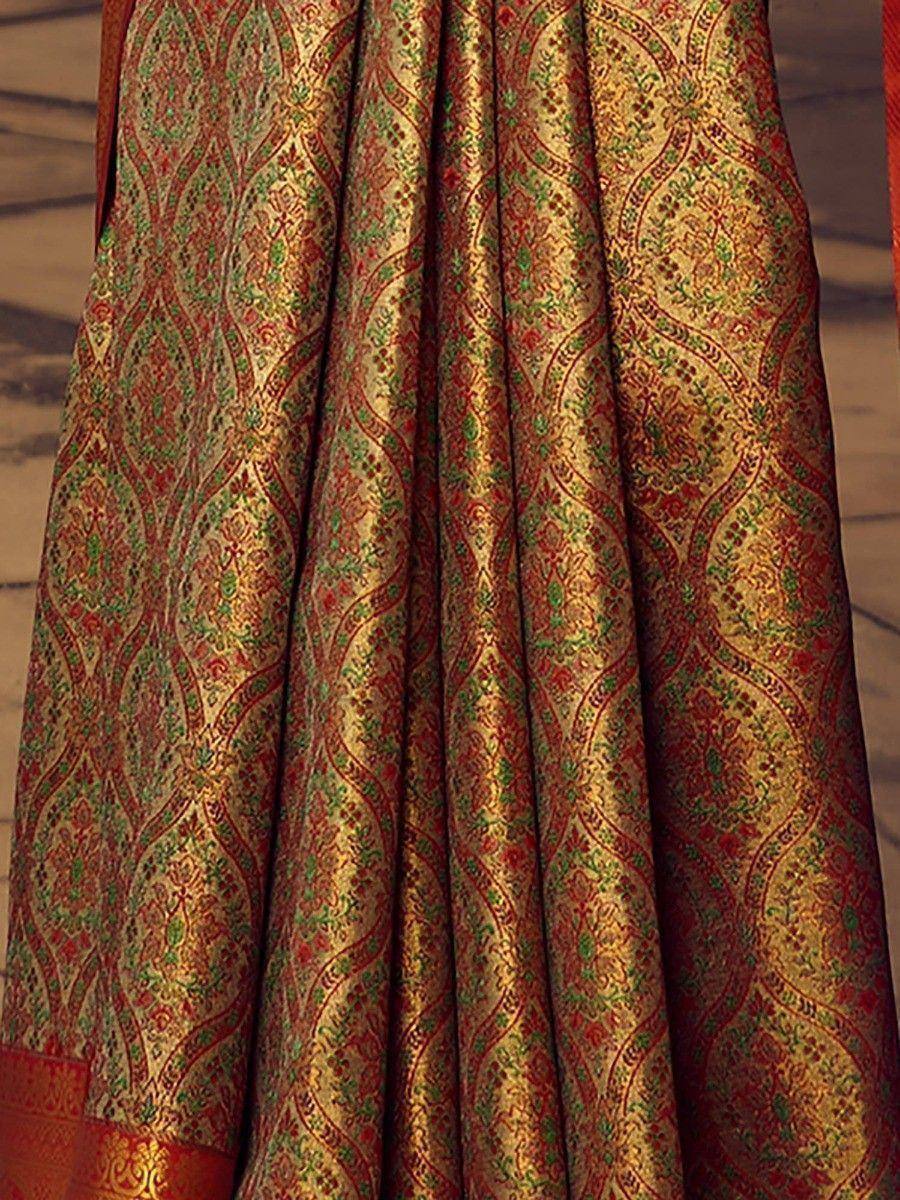 Rich gold and red ethnic lehenga skirt with intricate floral brocade pattern, perfect for Indian weddings.
