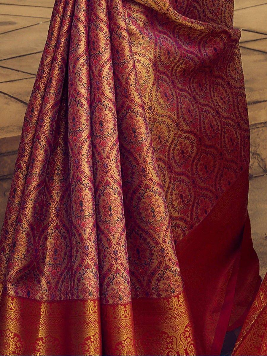 Rich maroon silk saree with gold zari paisley motifs and ornate border, ideal for Indian ethnic wear occasions