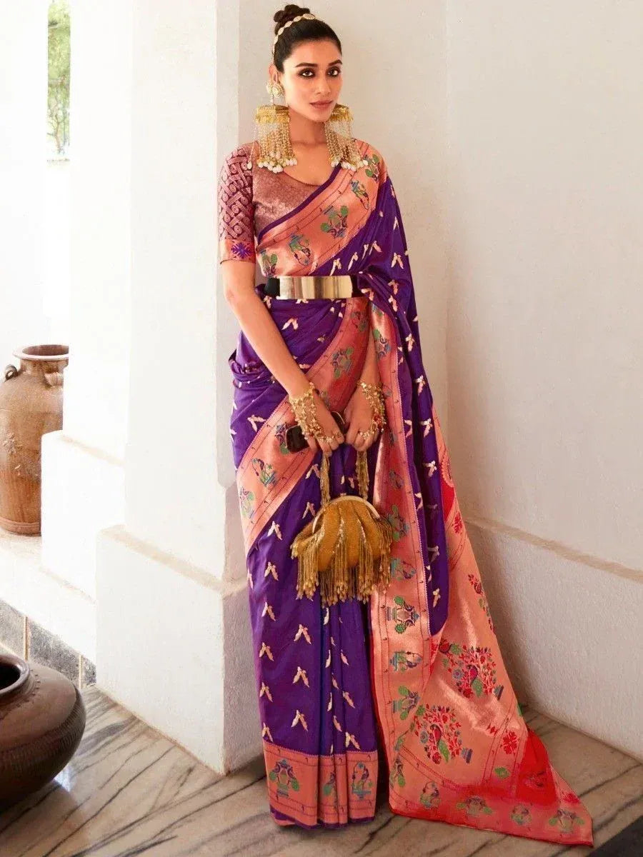 Woman in purple and peach floral saree with gold belt and jhumka earrings, Indian ethnic wear