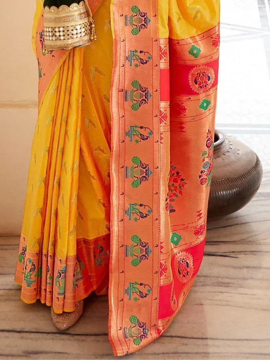 Yellow and peach Indian saree with peacock and floral motifs, ethnic wear for women