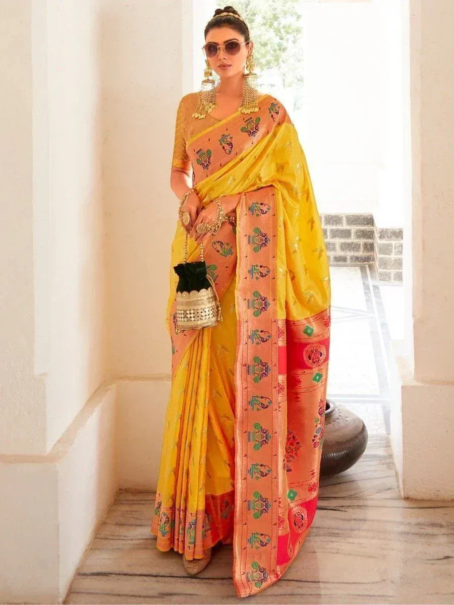 Yellow and peach embroidered saree with temple motifs, traditional Indian ethnic wear for women