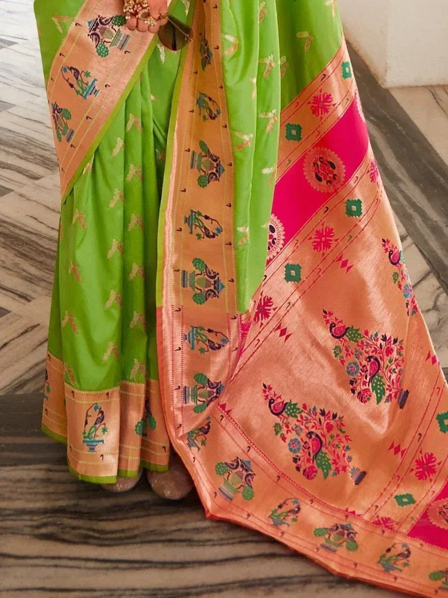 Vibrant green and peach saree with peacock and floral motifs, traditional Indian ethnic wear
