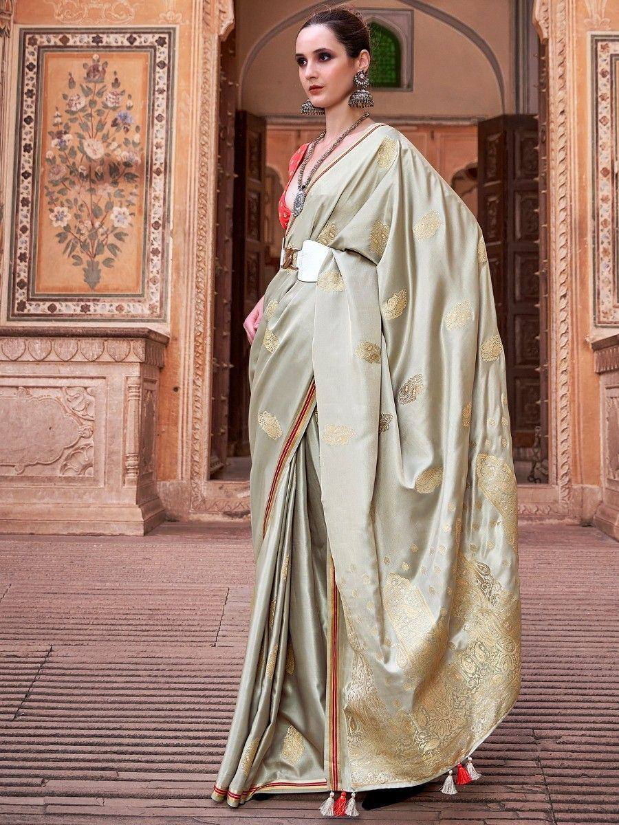 Elegant olive green saree with gold floral motifs, perfect for Indian ethnic occasions