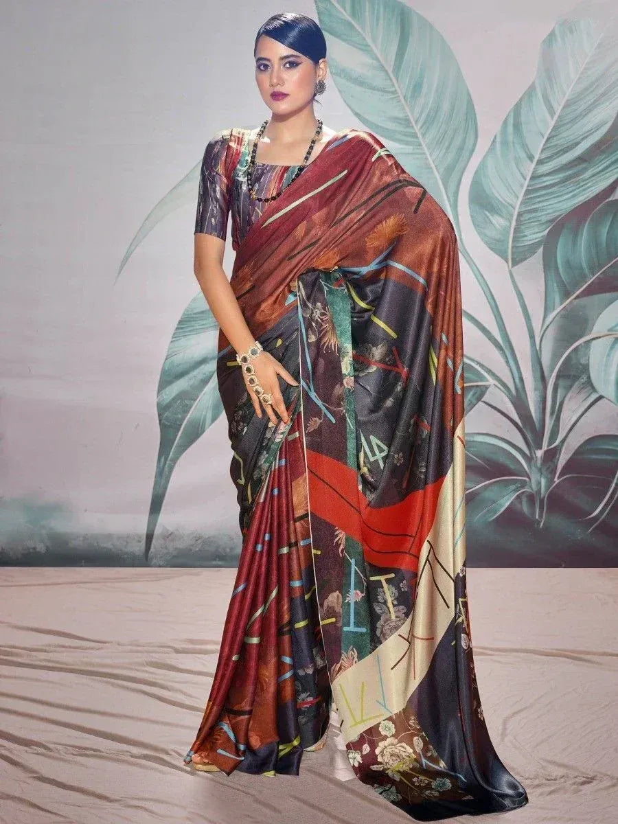 Woman in designer printed saree with floral and geometric patterns, ethnic wear for women