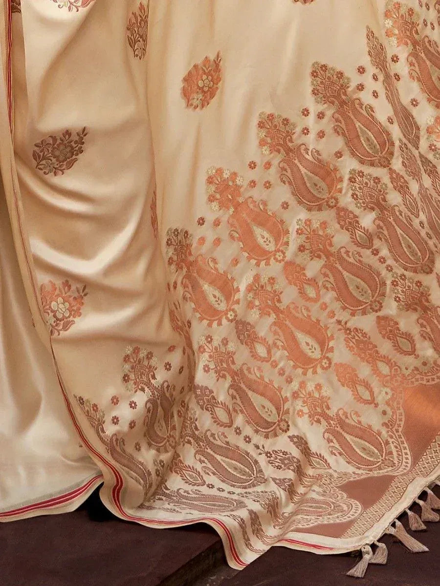 Cream silk saree with peach paisley print and tassels, Indian ethnic wear
