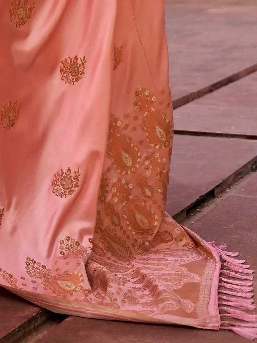 Pink silk saree with gold floral and paisley embroidery, tassel border, ethnic Indian wear