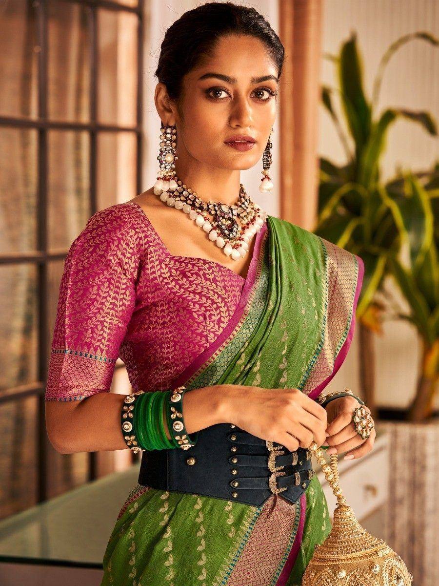 Woman in green saree with pink blouse, traditional Indian ethnic wear, designer jewelry, festive look