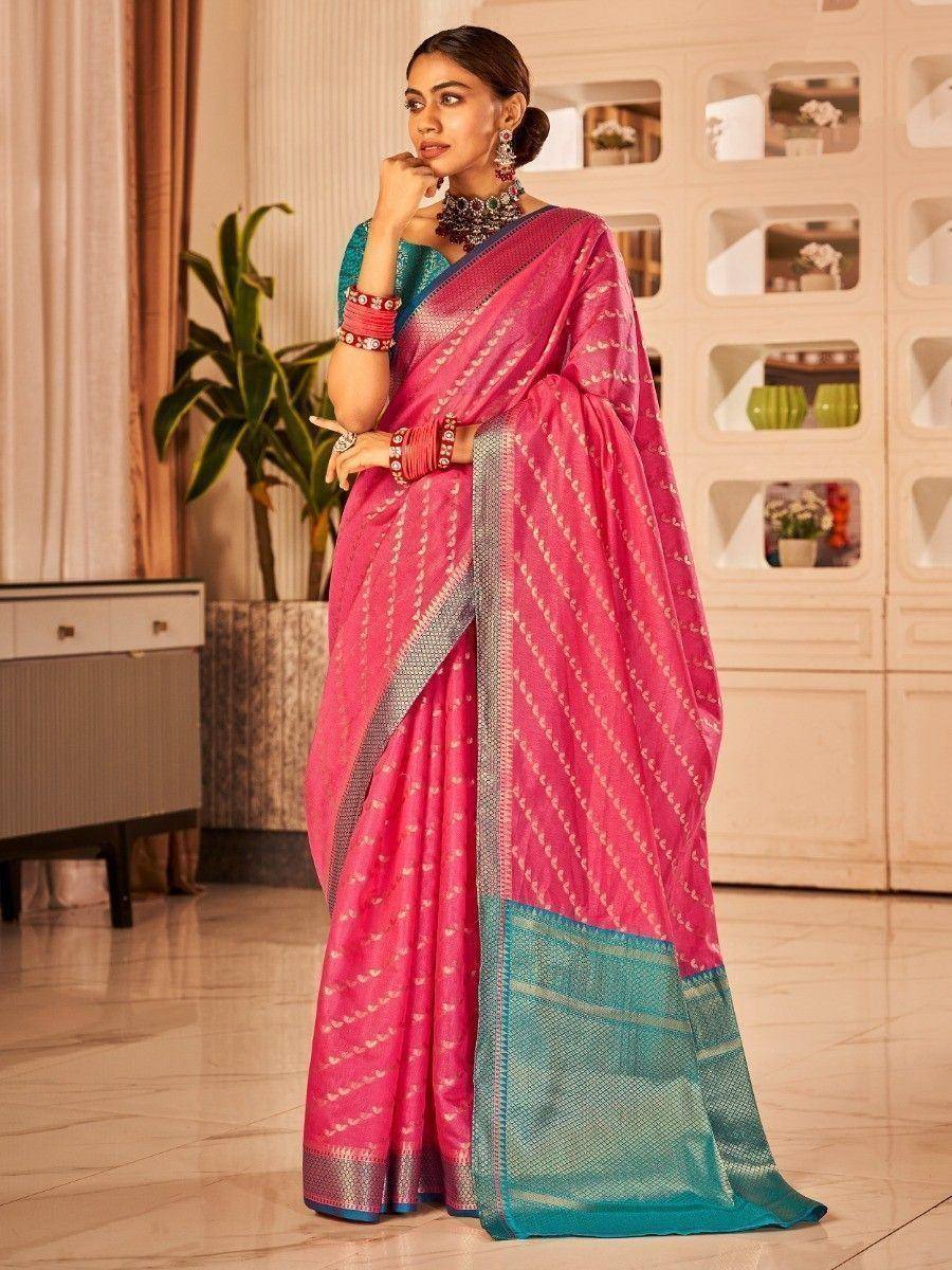Pink and teal designer saree with woven patterns, perfect for ethnic occasions