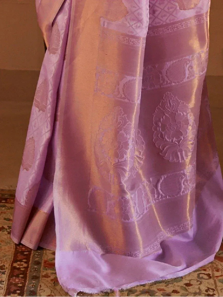 Lavender silk saree with intricate floral jacquard patterns, perfect for ethnic wear occasions