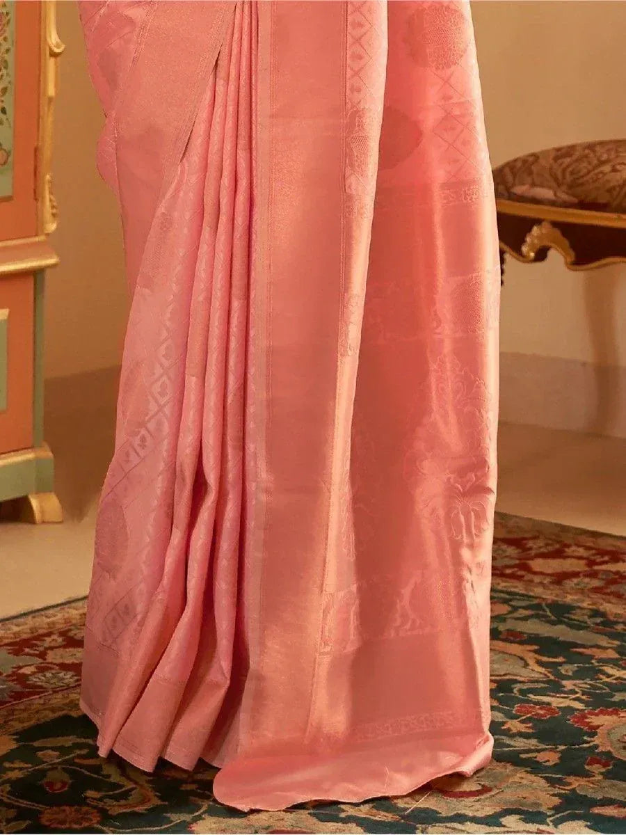 Pink designer saree with intricate woven patterns, elegant ethnic wear for women