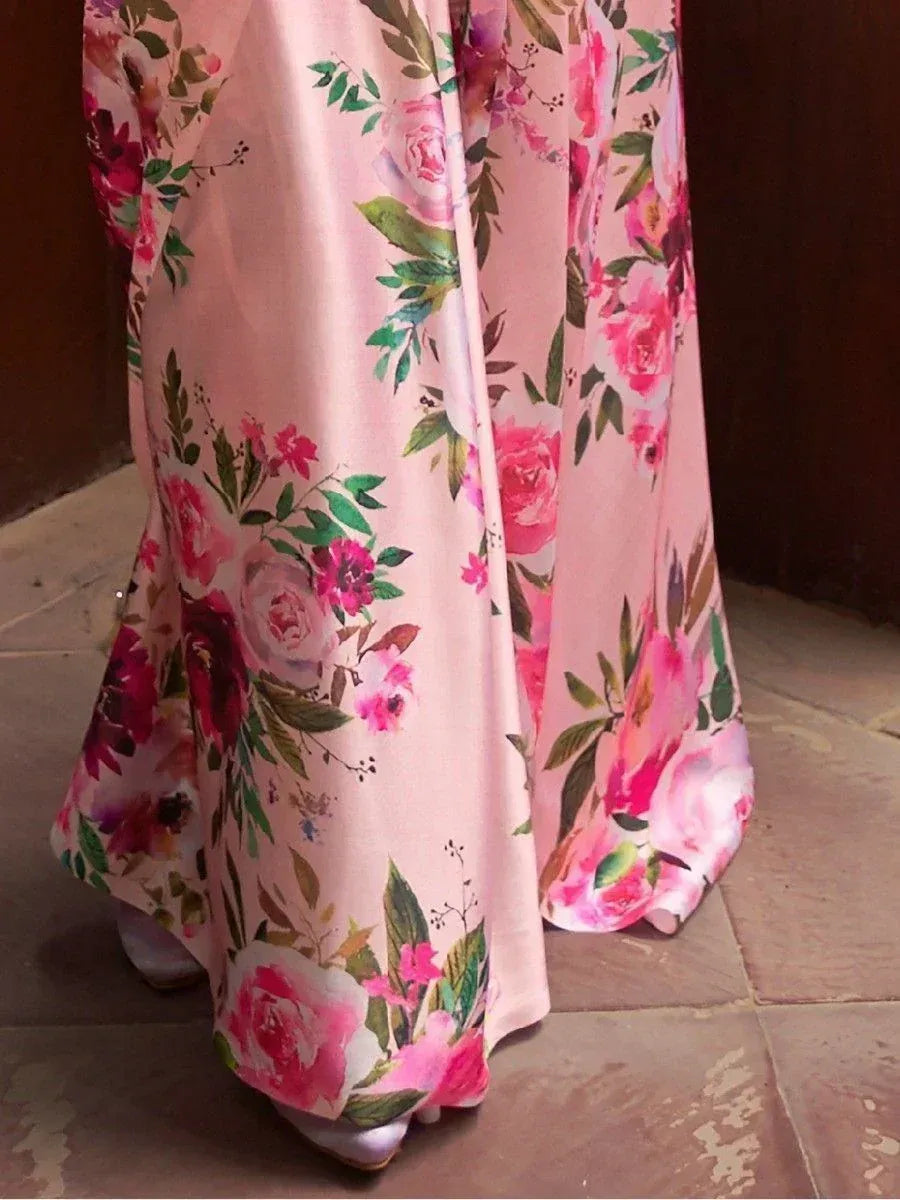 Pink floral print ethnic gown with rose pattern, perfect for Indian occasions and festive wear.