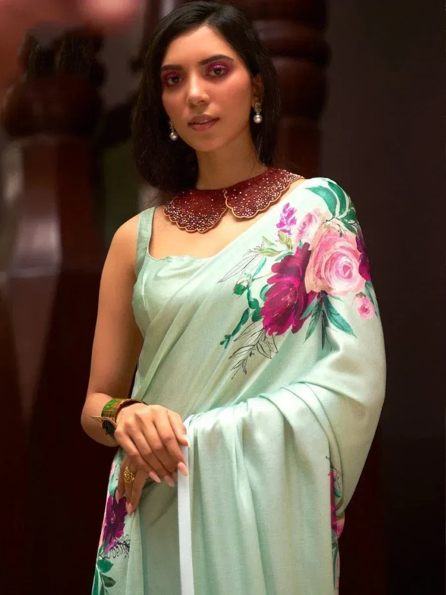 Mint green floral saree with embroidered neckline, perfect for Indian ethnic occasions