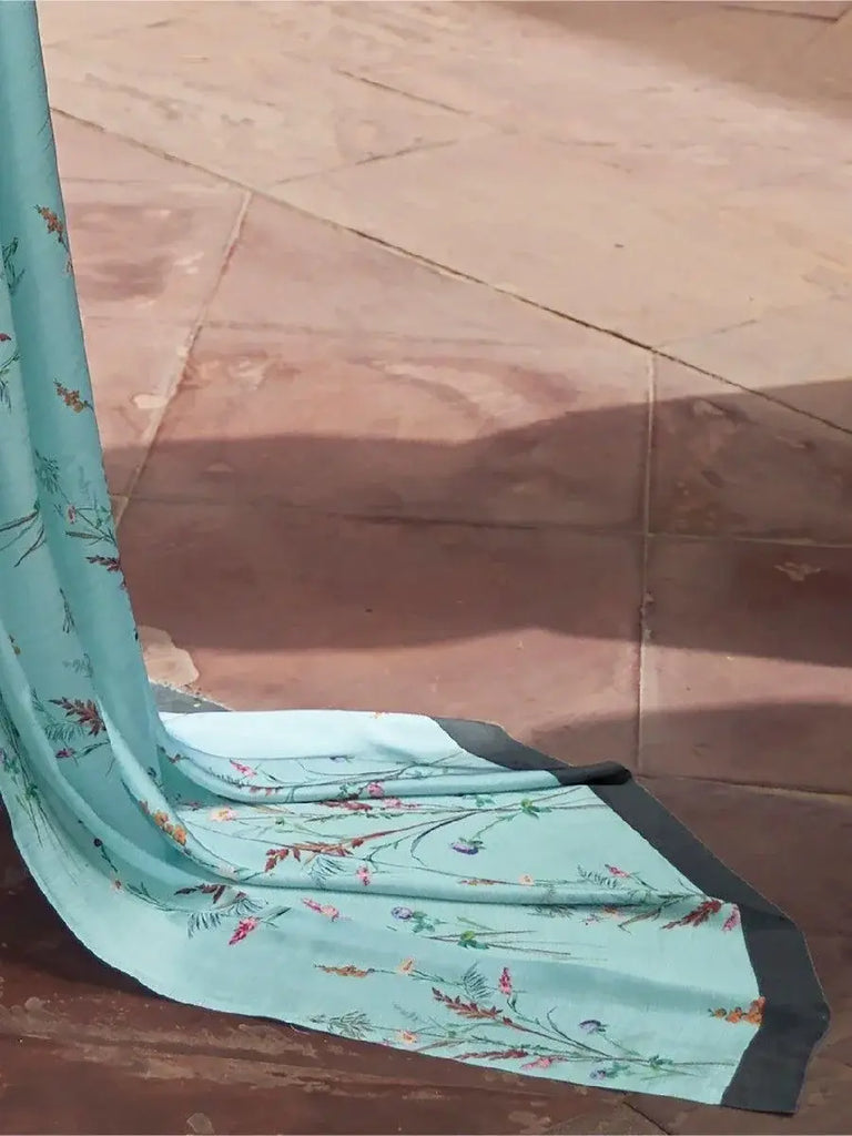 Captivating Sky Blue Floral Printed Satin Saree With Blouse