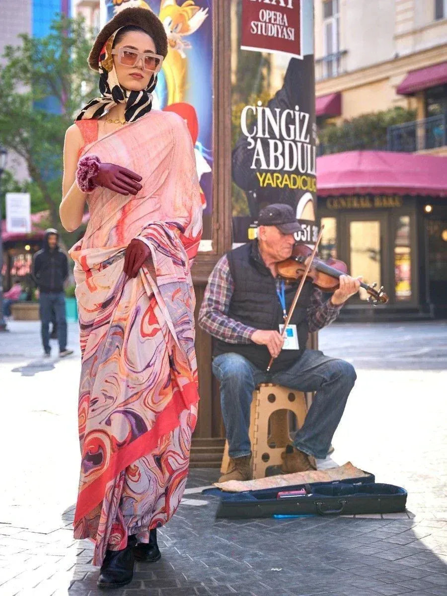 Woman in stylish printed saree with bold accessories on city street, showcasing ethnic fashion trends