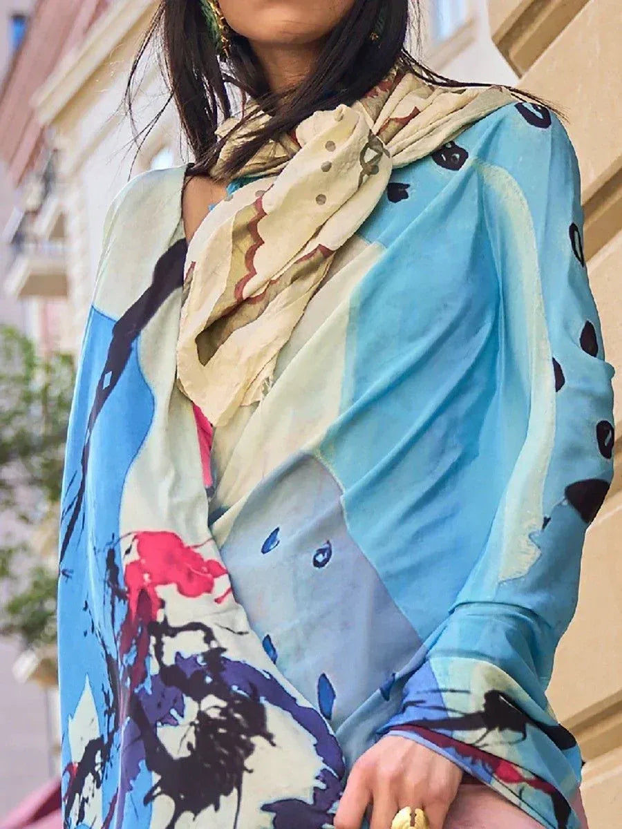 Woman wearing colorful printed ethnic gown with scarf, perfect for Indian fashion lovers
