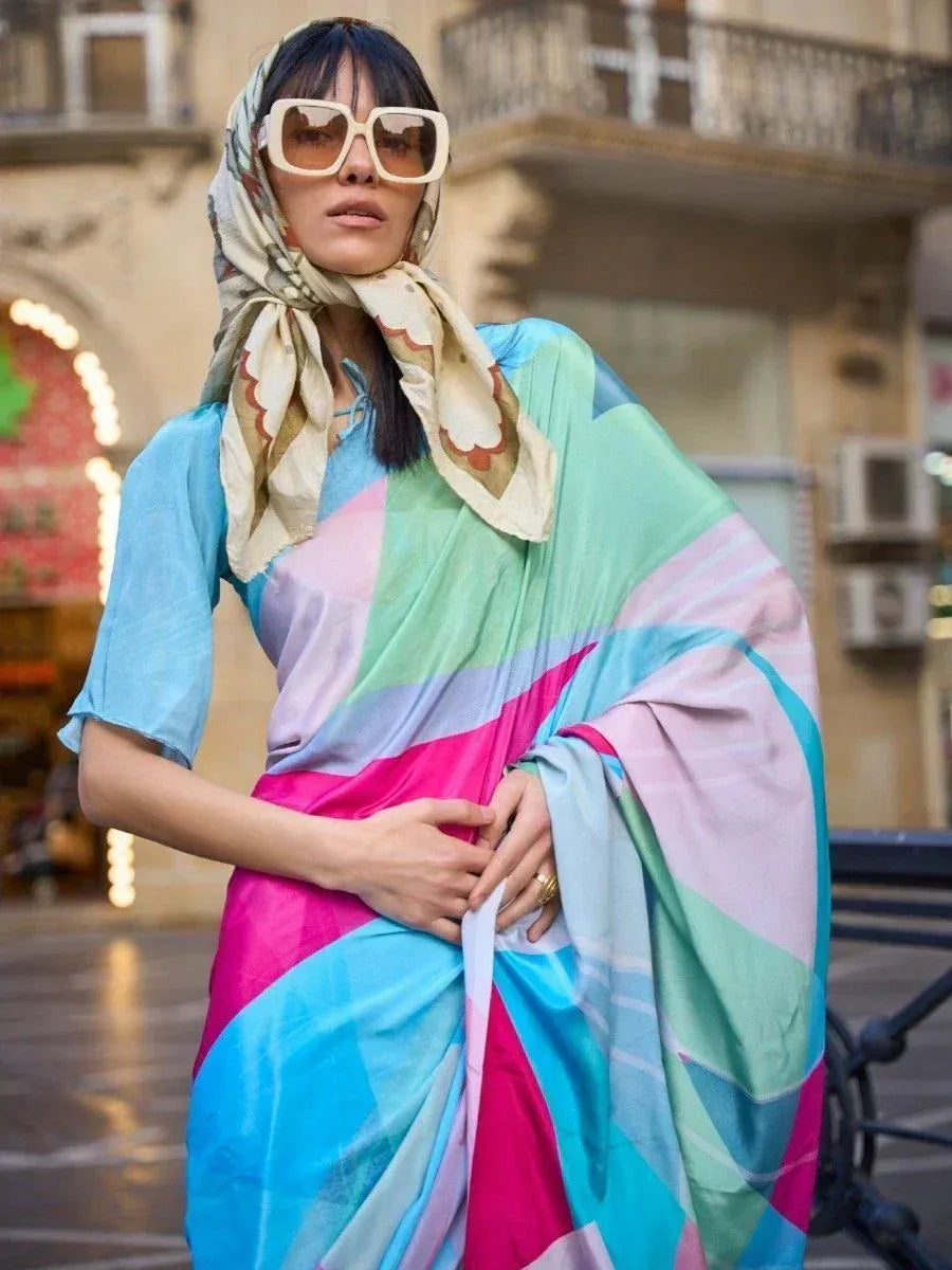 Woman in colorful geometric saree with printed scarf, stylish sunglasses, urban street setting