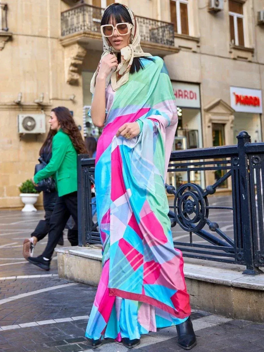 Woman in colorful geometric print saree with headscarf, styled for street fashion