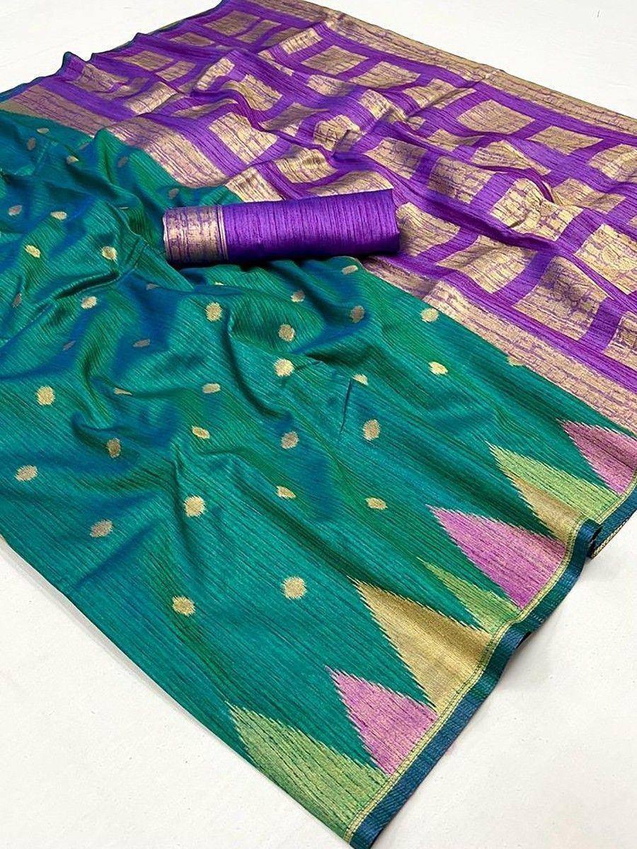 Teal and purple ikat saree with gold dots and geometric border, paired with matching blouse piece