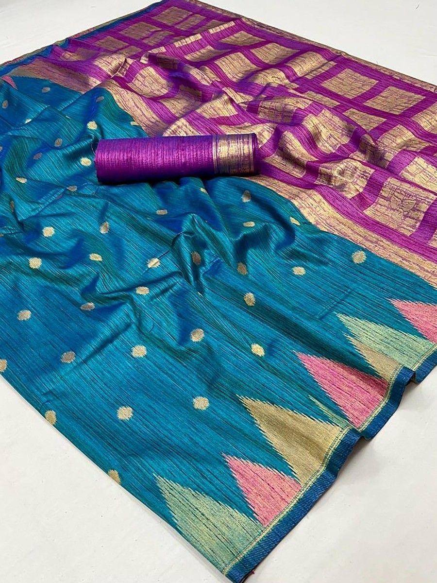 Teal and purple designer saree with gold motifs and ikat border, perfect for ethnic wear