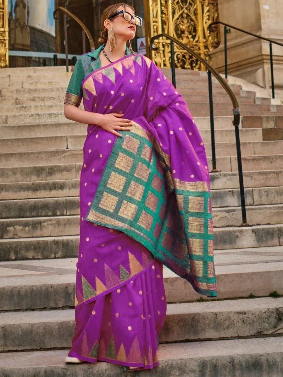 Purple ethnic saree with green border and geometric print, styled with matching blouse for Indian occasions