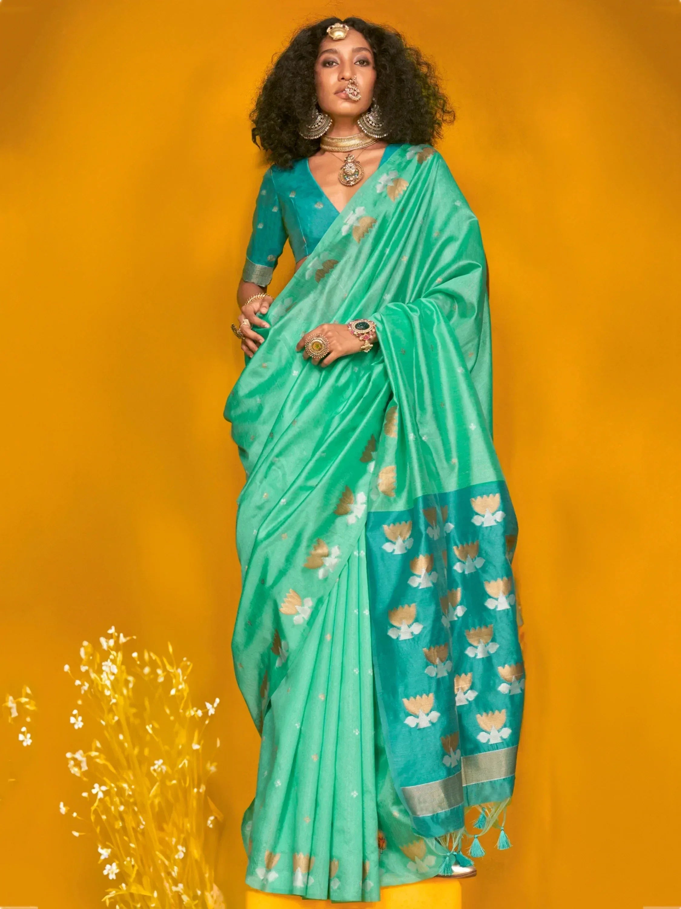 Teal floral saree with gold motifs, traditional Indian ethnic wear for women