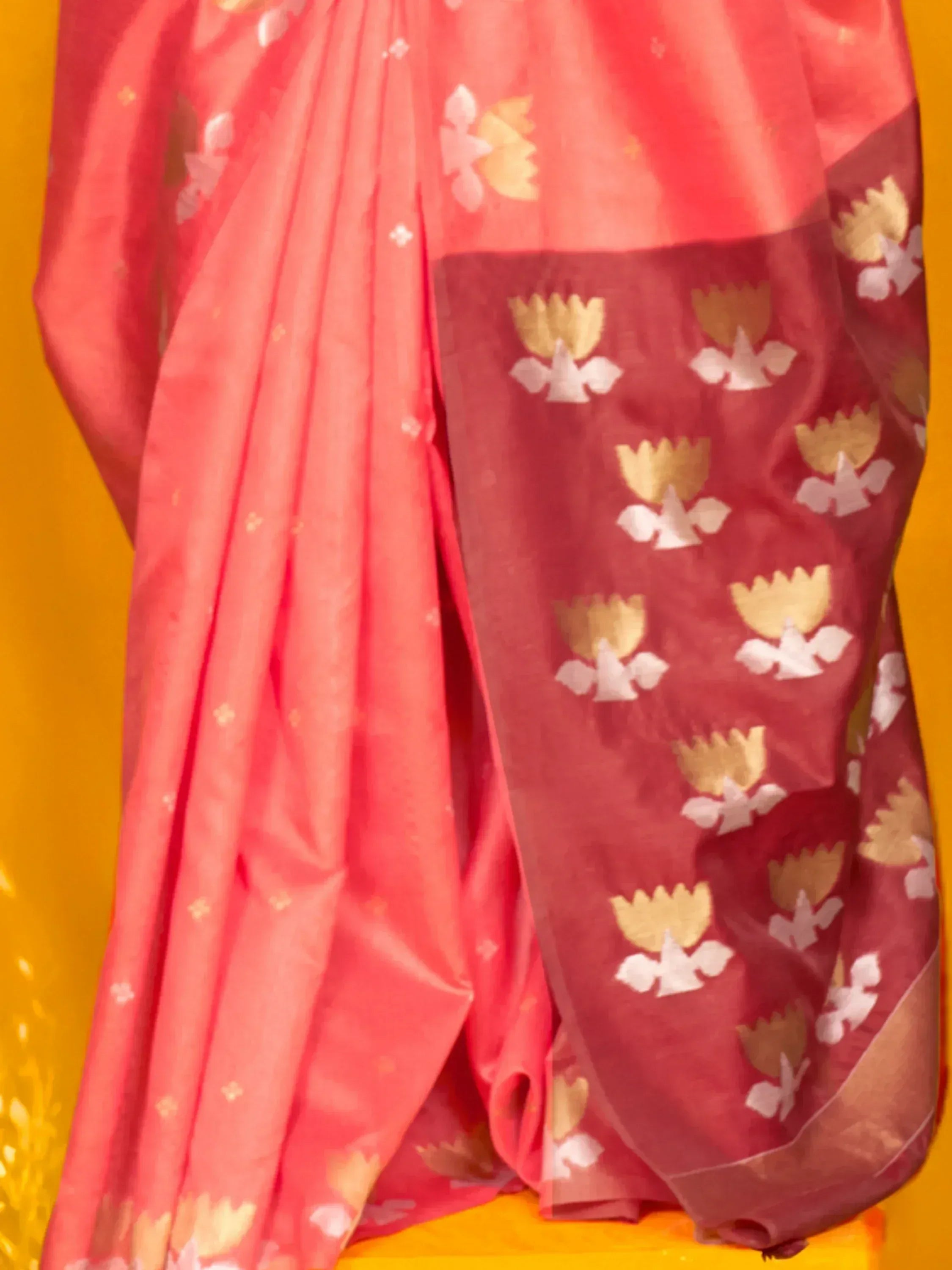 Pink and red ethnic saree with gold and white floral print, ideal for Indian occasions