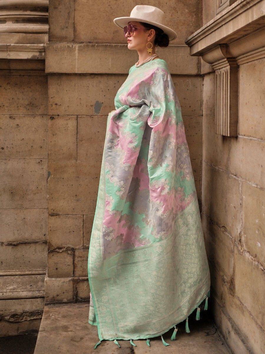 Mint pink floral printed ethnic gown with tassels, styled with hat and sunglasses for modern Indian fashion