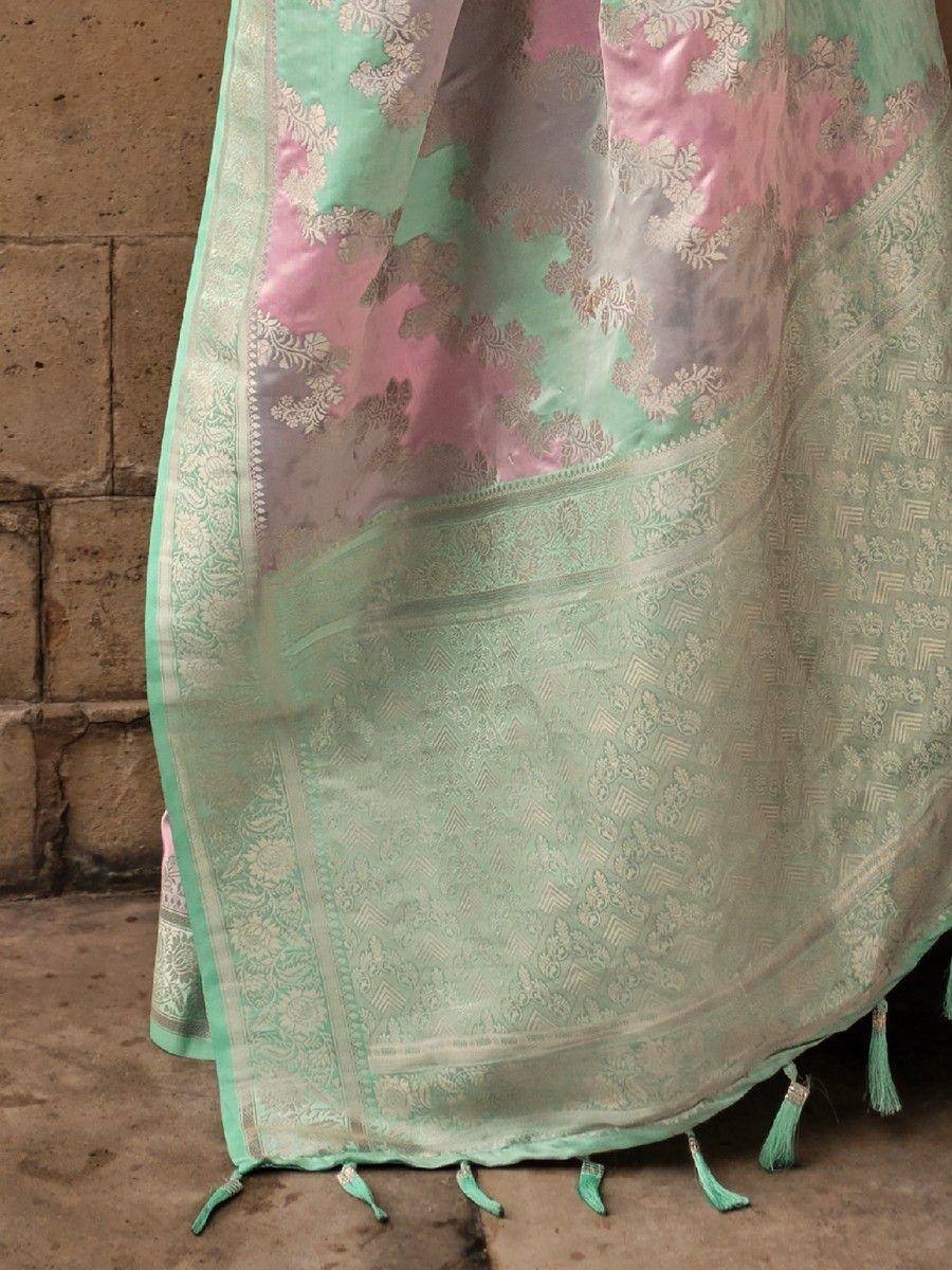 Mint green and pink designer saree with gold zari work and tassels, perfect for ethnic occasions
