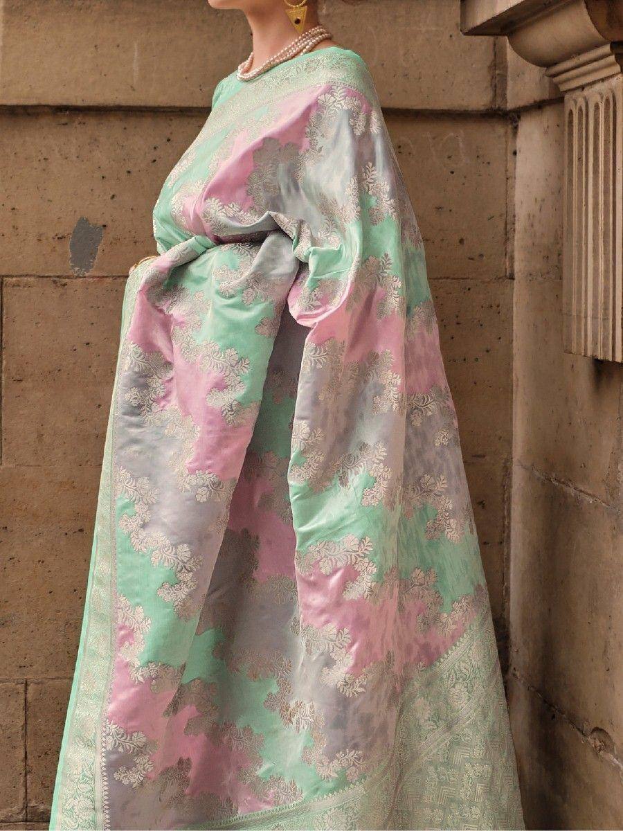 Pastel pink and mint green designer saree with floral embroidery, perfect for ethnic occasions