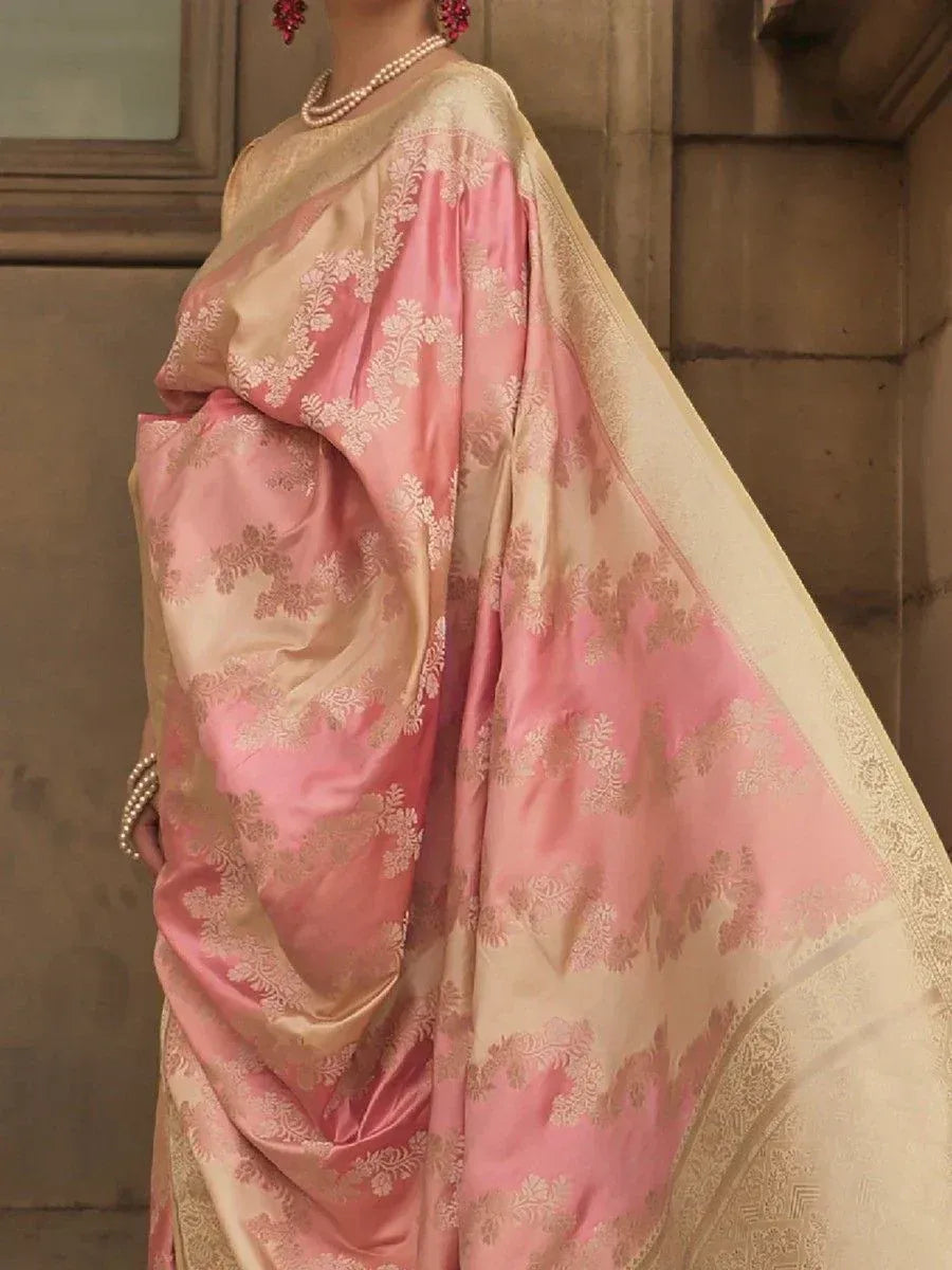 Pink and gold designer saree with floral embroidery, perfect for ethnic occasions