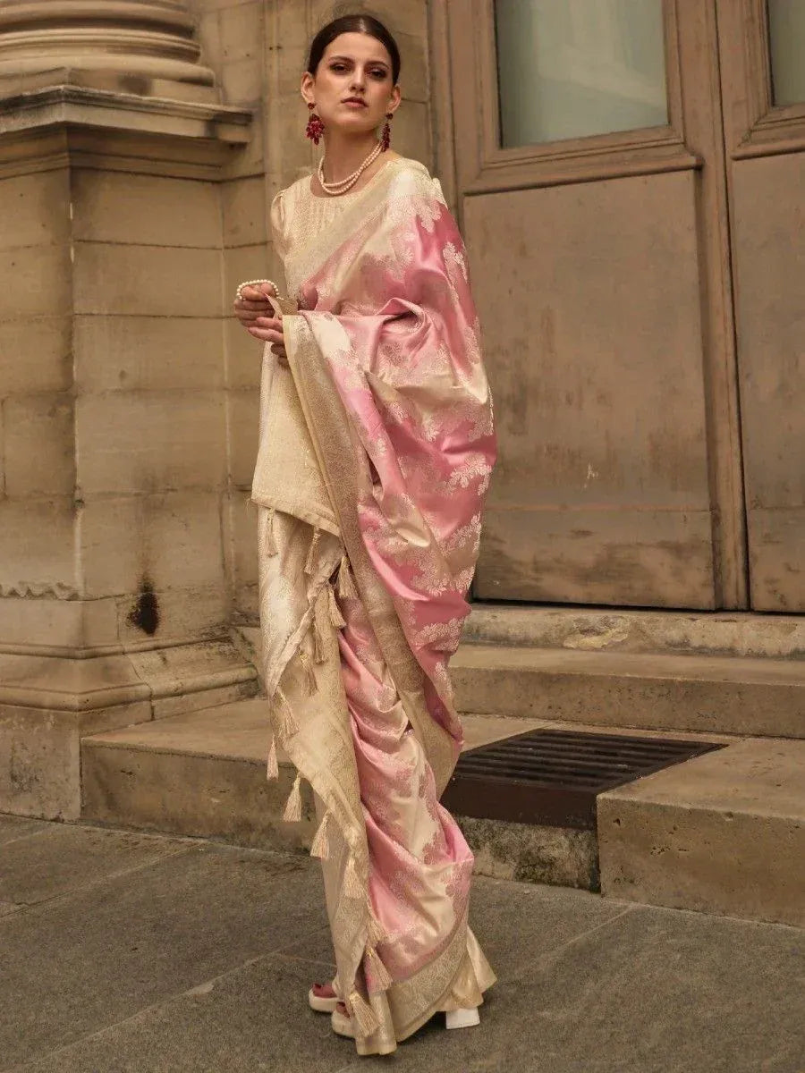 Elegant pink and gold designer saree with intricate embroidery, perfect for ethnic occasions