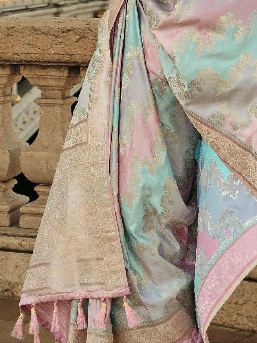 Pastel pink and mint green designer saree with gold floral embroidery and tassels, perfect for ethnic occasions