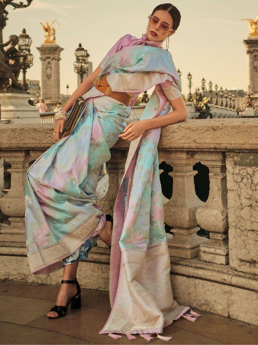 Pastel printed saree with cape-style blouse, styled for modern ethnic wear