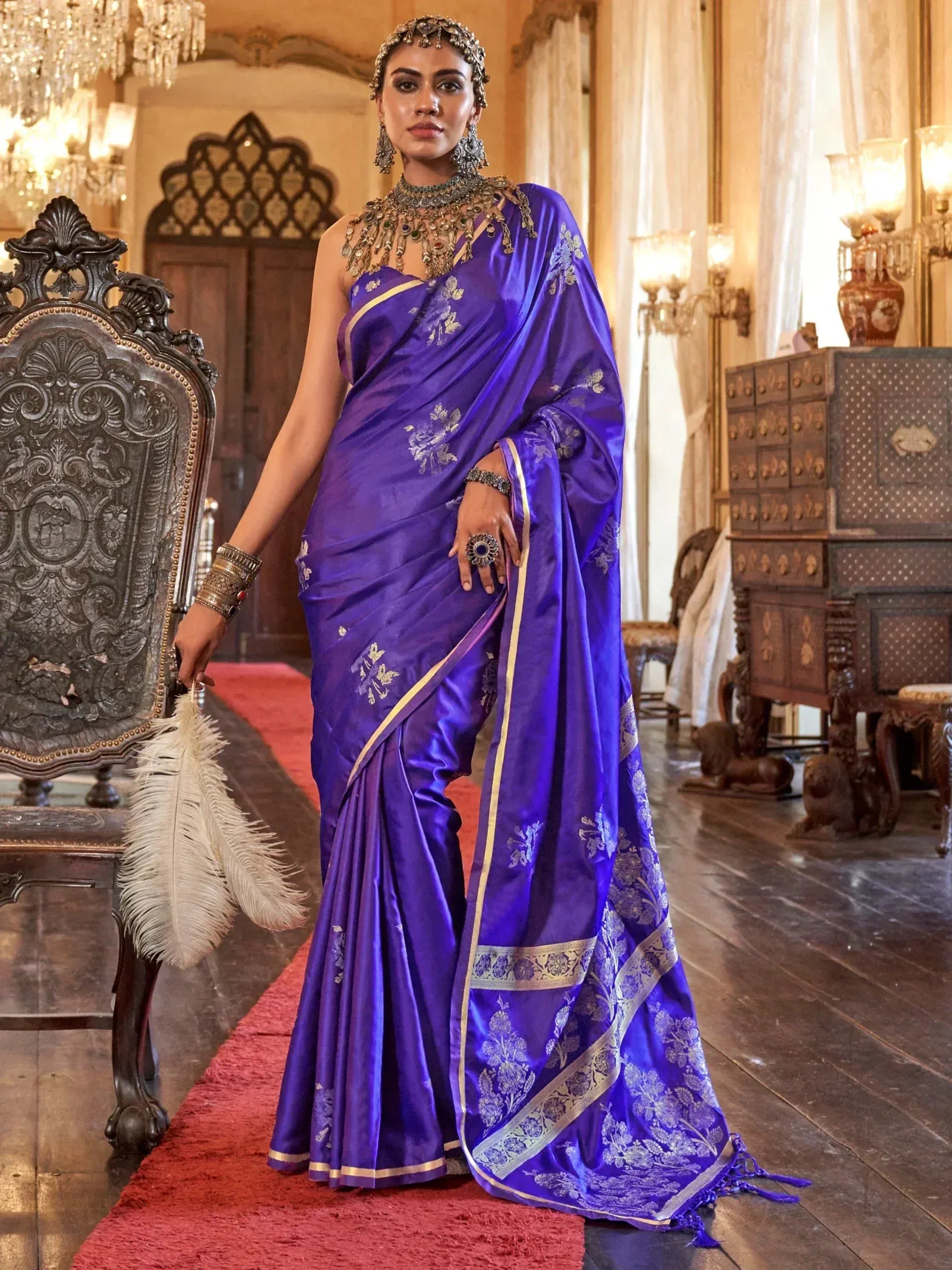 Royal purple silk saree with gold floral embroidery, perfect for Indian ethnic wear and festive occasions.