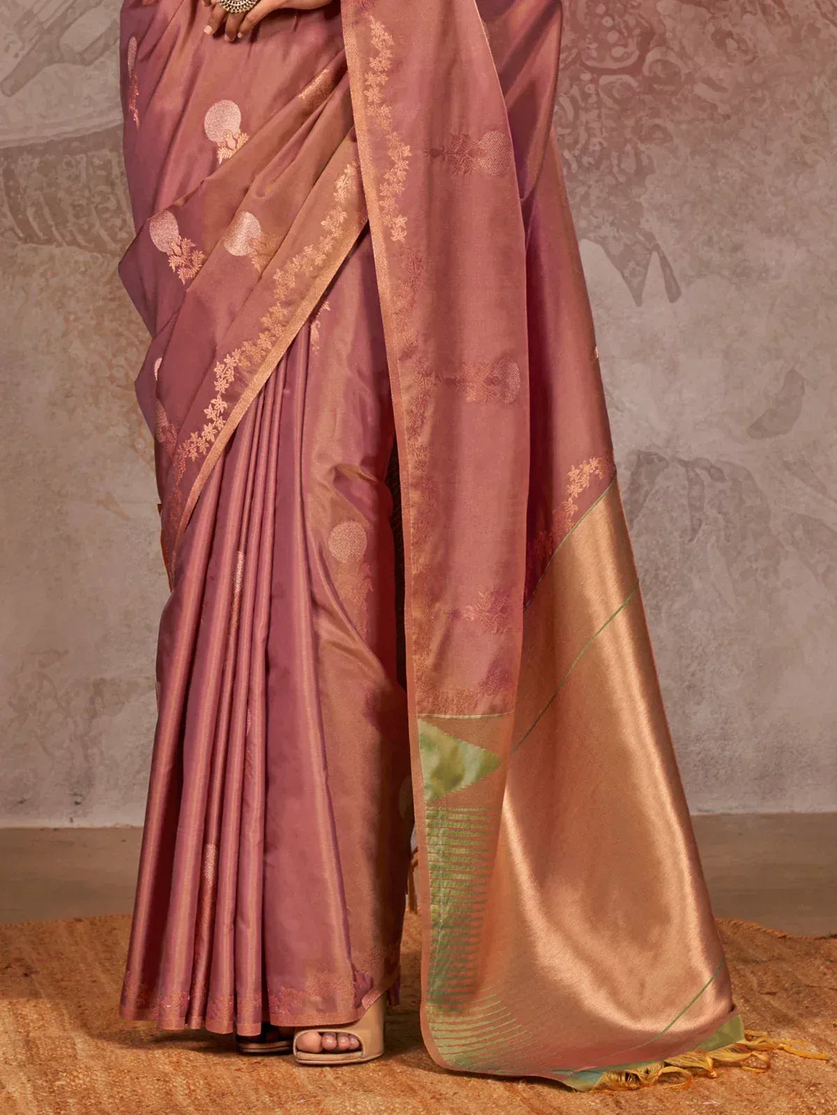 Elegant mauve silk saree with gold floral motifs and contrast border, perfect for Indian ethnic wear occasions