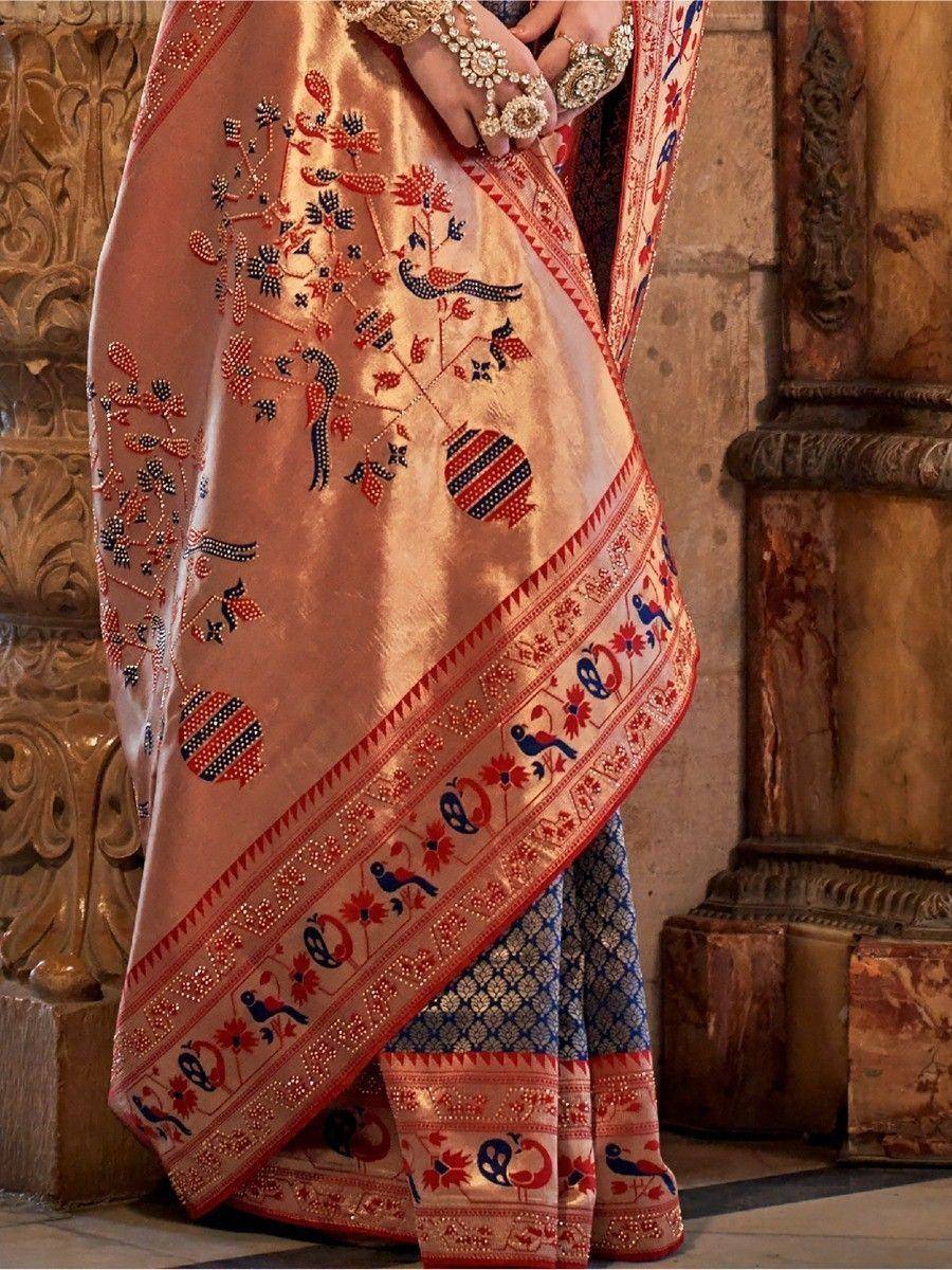 Elegant peach saree with bird and floral embroidery, perfect for Indian ethnic wear occasions