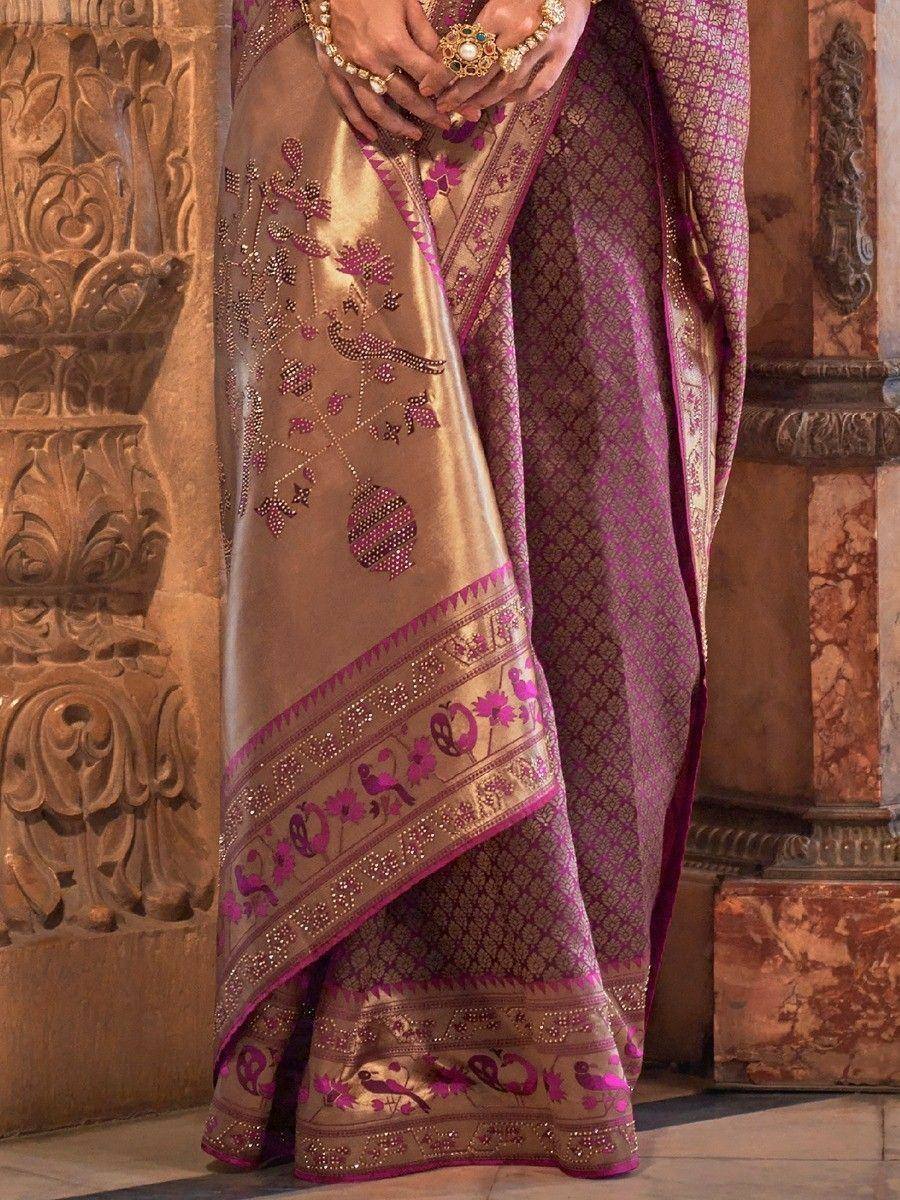Elegant purple and gold saree with floral embroidery and zari border, perfect for Indian ethnic wear occasions.