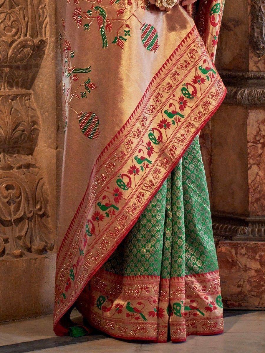 Elegant green and gold saree with peacock embroidery, perfect for Indian ethnic wear occasions.