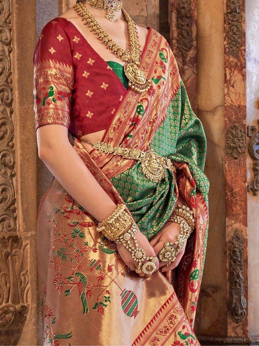 Red and green designer saree with gold embroidery, traditional Indian ethnic wear, heavy jewelry